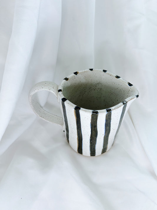 Navy striped pitcher