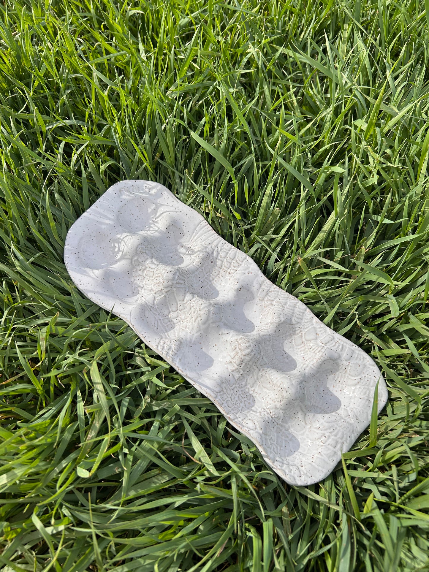 White lace egg tray