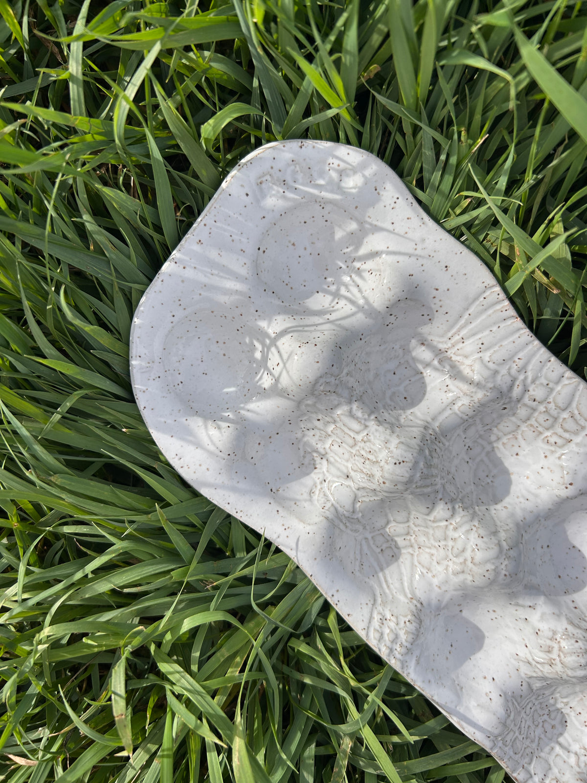White lace egg tray