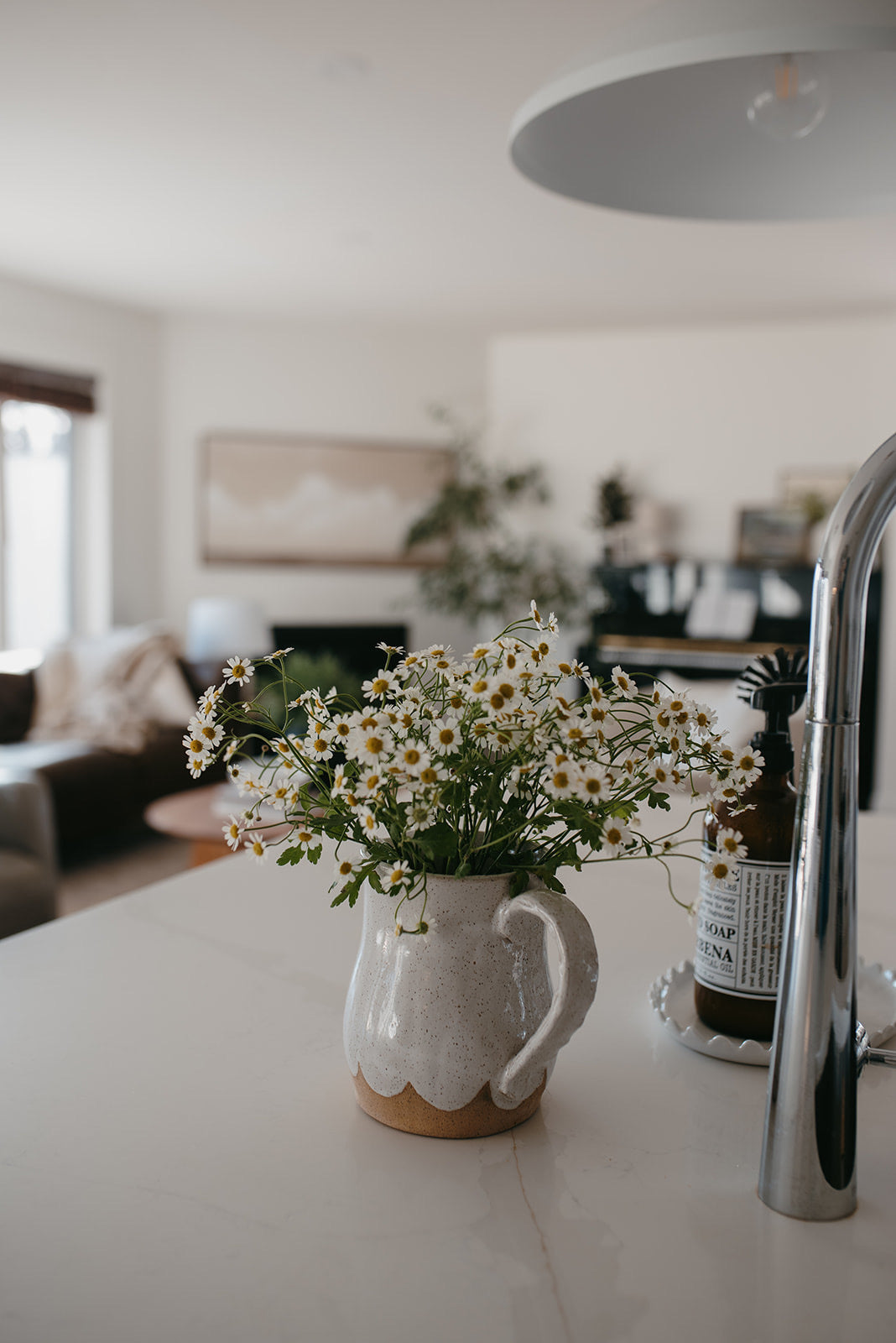Scalloped water pitcher