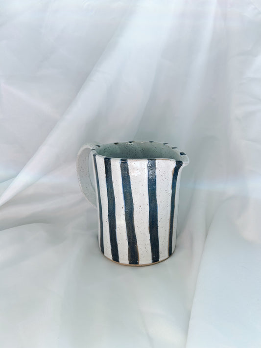 Navy striped pitcher