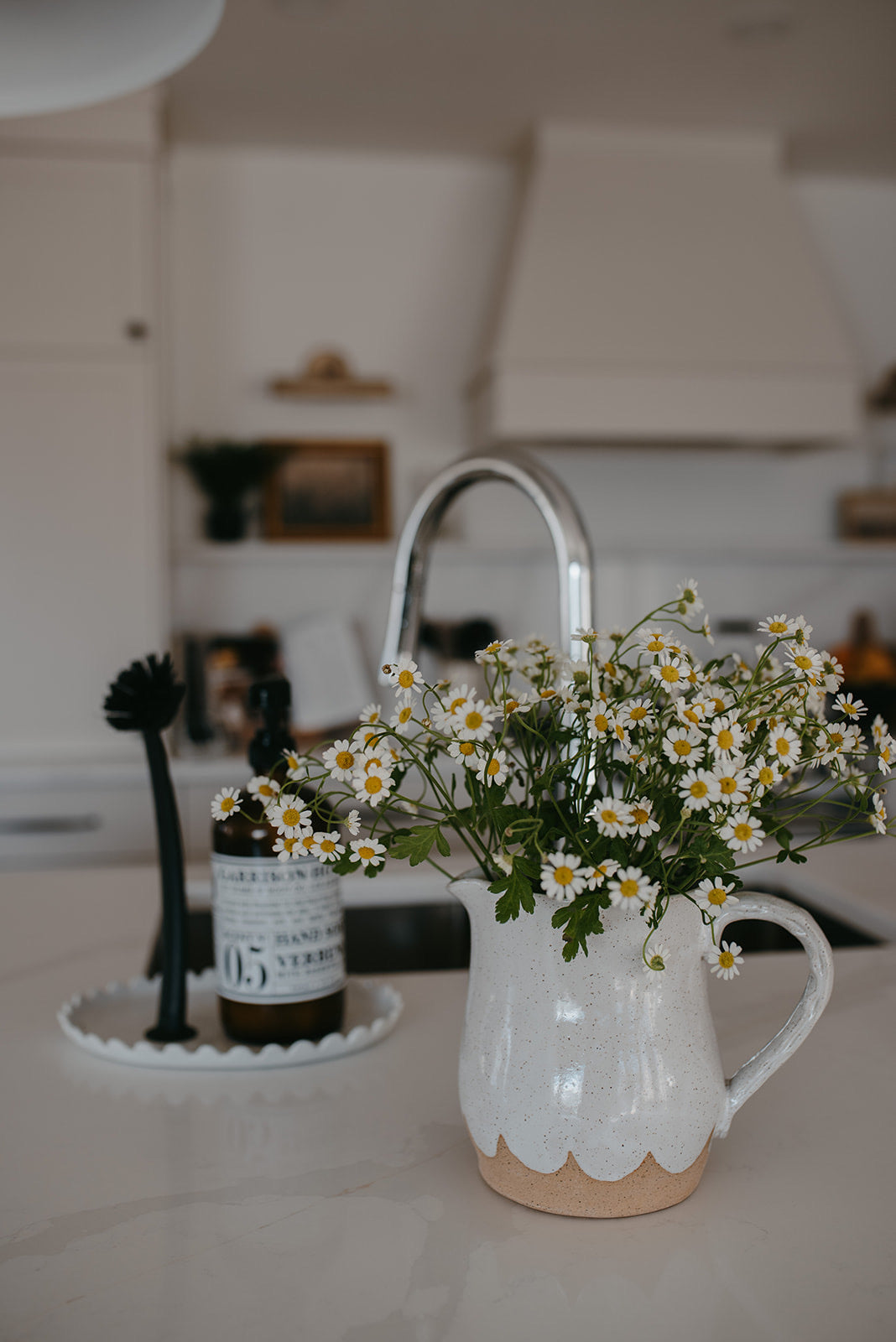 Scalloped water pitcher