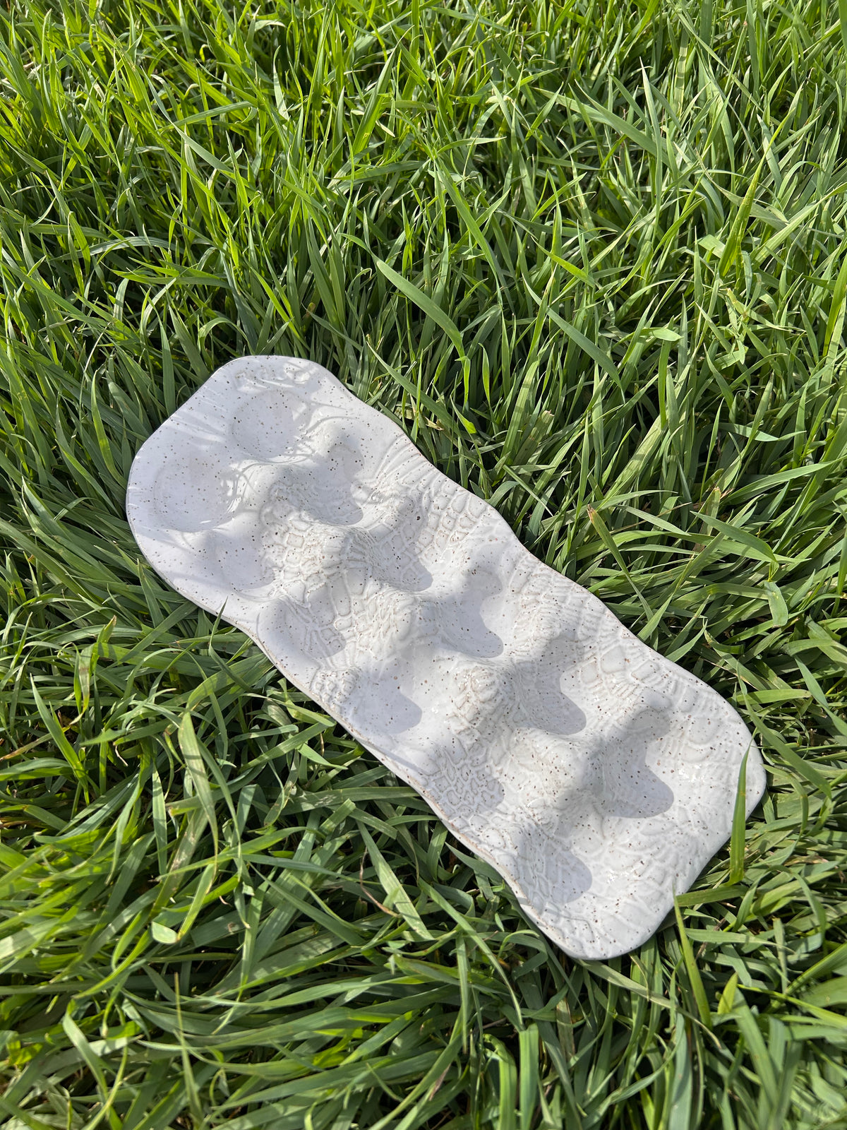 White lace egg tray