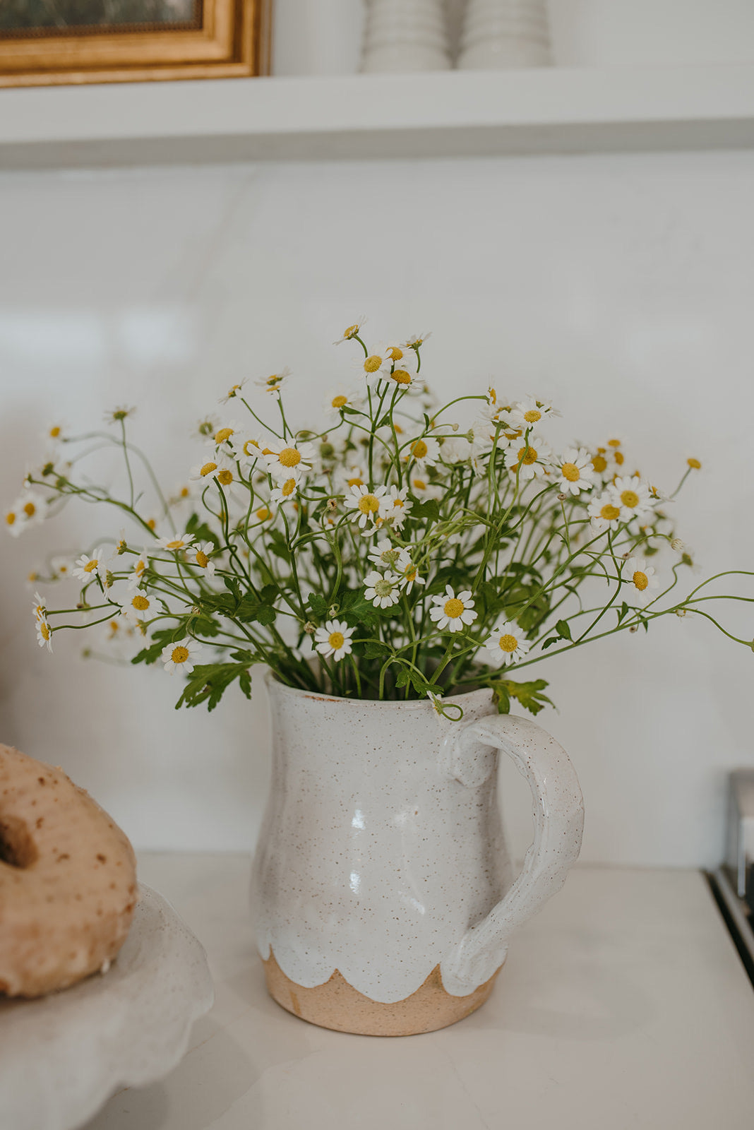 Scalloped water pitcher