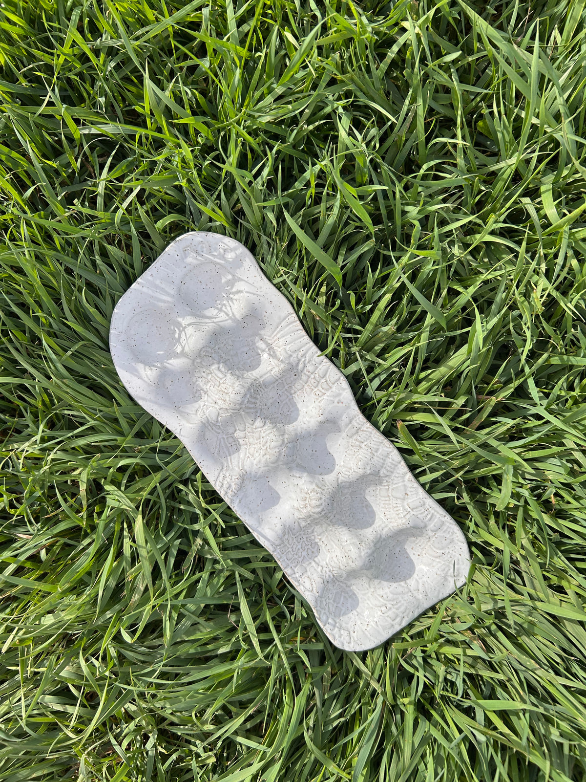 White lace egg tray